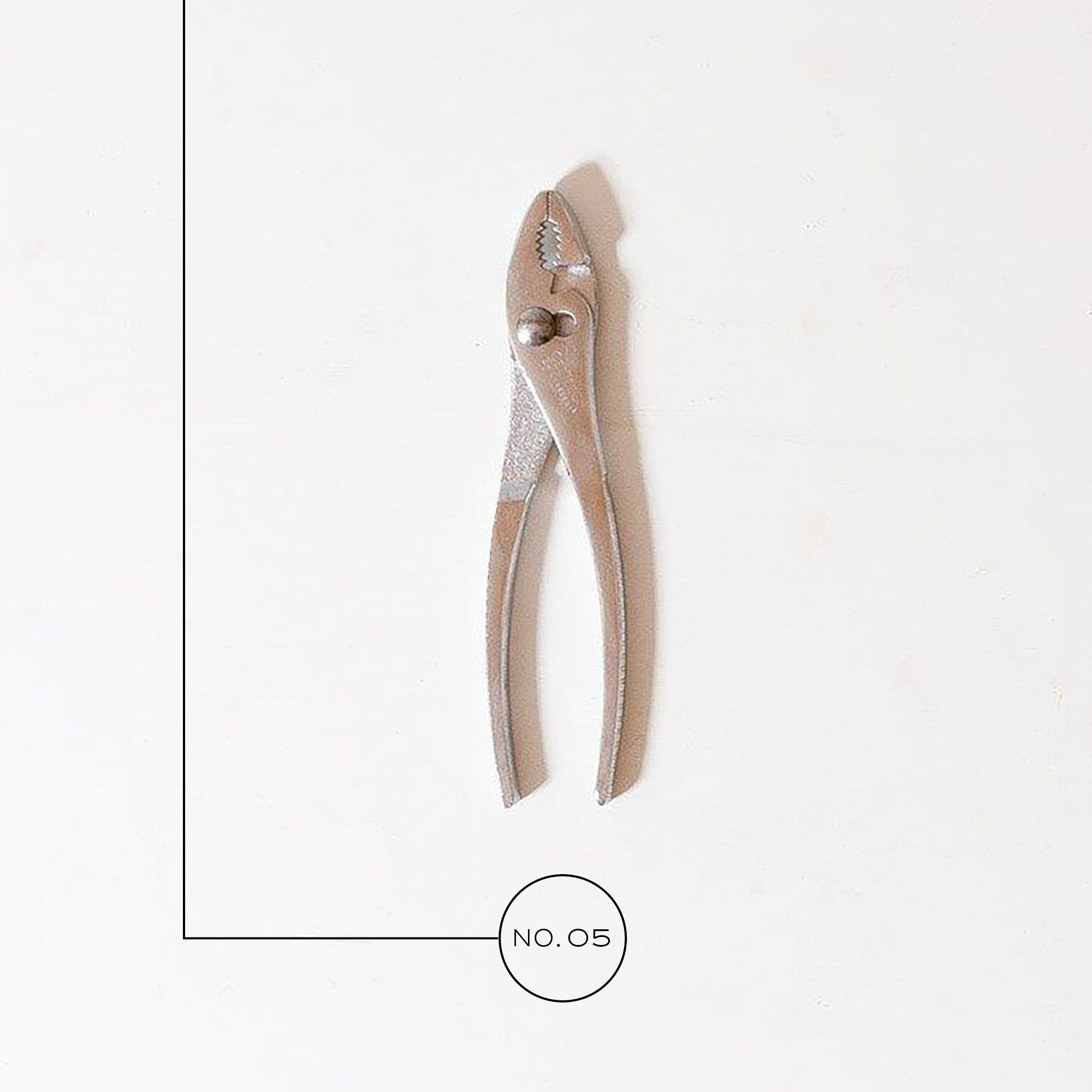 A photo of pliers on a white background.